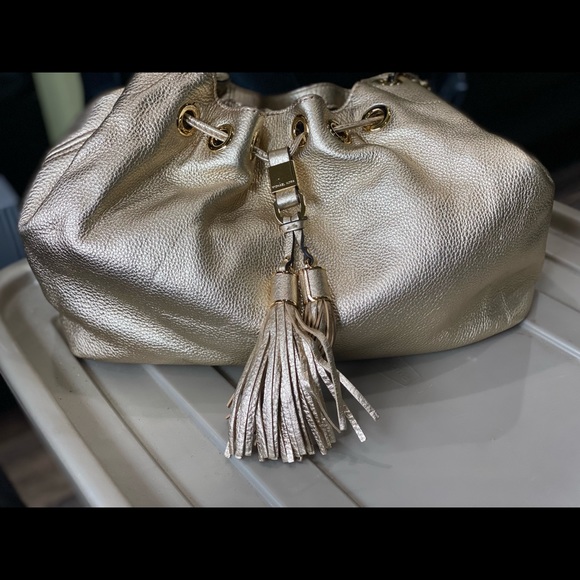 MK handbags gold with gold hard ware. - Picture 2 of 7